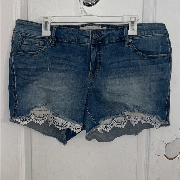 Torrid denim shorts light wash, distressing, hem white crochet or lace trim - Picture 5 of 8